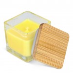 Vela de cera vegetal en tarro de cristal con tapa de bambú color amarillo tercera vista