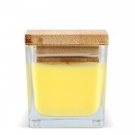 Vela de cera vegetal en tarro de cristal con tapa de bambú color amarillo quinta vista