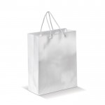 Bolsa mediana de papel laminado de colores con asa de cordón color blanco