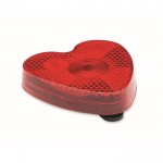 Reflector de luz roja en forma de corazón con clip para sujeción color rojo