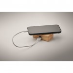 Auriculares inalámbricos con micrófono en estuche de bambú color madera vista fotografía