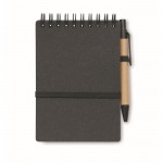 Libreta con bolígrafo de tinta azul y banda elástica hojas a rayas color gris oscuro segunda vista