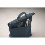 Bolsa nevera personal con cierre rolltop y asa de transporte color azul vista fotografía tercera vista