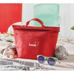 Bolsa nevera personal con cierre rolltop y asa de transporte color rojo vista bodegón principal