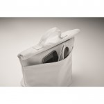 Bolsa nevera personal con cierre rolltop y asa de transporte color blanco vista fotografía tercera vista