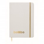 Libreta con banda elástica y marca páginas a color páginas a rayas A5 color dorado vista principal cuarta vista