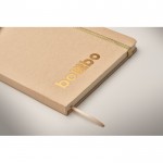 Libreta de cartón con banda y marca páginas a color hojas a rayas A5 color dorado vista fotografía