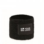 Muñequera de ejercicio de poli algodón con parche personalizable color negro vista de impresión
