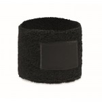 Muñequera de ejercicio de poli algodón con parche personalizable color negro