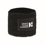 Muñequera de ejercicio de poli algodón con parche personalizable color negro vista principal