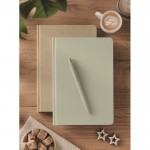Libreta hecha de caña de azúcar de tapa dura A5 papel a rayas color verde menta segunda vista bodegón principal