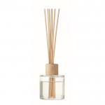 Elegante difusor de fragancia con olor a vainilla con detalle de bambú color transparente
