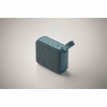 Pequeño altavoz inalámbrico con asa a juego para transporte color negro mate vista fotografía cuarta vista