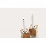 Set velas alargadas con soporte de color madera vista fotografía
