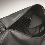 Bolsa de viaje de lona con base acolchada, asas y cinta color negro vista fotografía octava vista