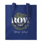 Bolsa de algodón colores de 180 gr/m2 color azul cuarta vista con logo