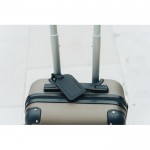 Etiqueta de seguimiento para equipaje con Find My de Apple color negro vista de ambiente