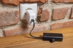 Powerbank portátil de plástico reciclado con cable tipo asa 3.000 mAh color negro