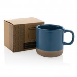 Taza de cerámica esmaltada en dos colores color azul vista con caja