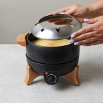 Fondue eléctrica con control preciso y capacidad para 8 personas Boska color negro vista de ambiente 2