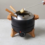 Fondue eléctrica con control preciso y capacidad para 8 personas Boska color negro vista de ambiente 3