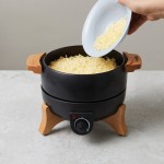 Fondue eléctrica con control preciso y capacidad para 8 personas Boska color negro vista de ambiente 4