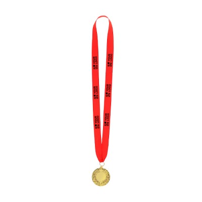 Medalla ganadora de acabado dorado con relieve en el borde