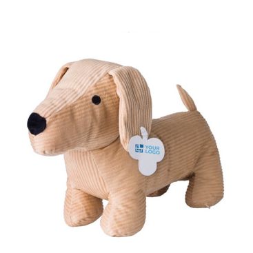 Perro de peluche de pana con los ojos bordados y etiqueta