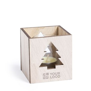 Vela aromática de Navidad con árbol para publicidad