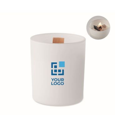 Vela en tarro de vidrio con piedras en el interior y aroma a vainilla