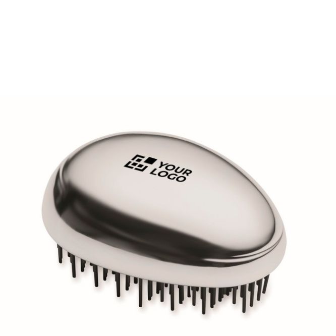 Cepillo de plástico y aluminio para cabello con función desenredante